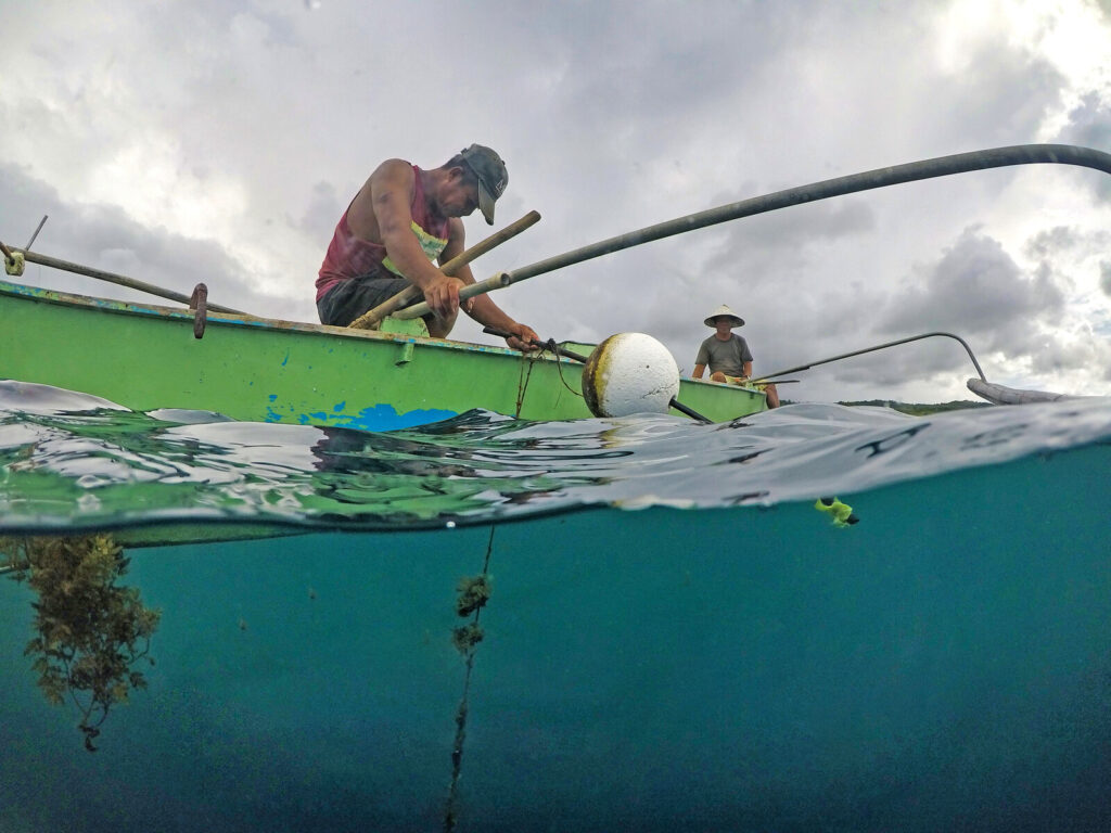 Fishers in the Philippines as seen from the water surface