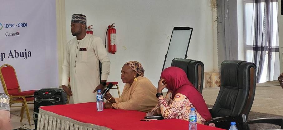 Figure 4: Ms. Halima Amadou, President of the Women’s Association (Groups de femmes - Sa’a) in Maradi, alongside Aisha Salisu, a CLARITY Community Hydrologist from Jibiya, speaking at the CLARITY Annual Meet on 23 June 2026 with CLARITY researcher, Dr. Boukari Issoufou Ousmane, in Abuja, Nigeria (credit: R. Taylor).   